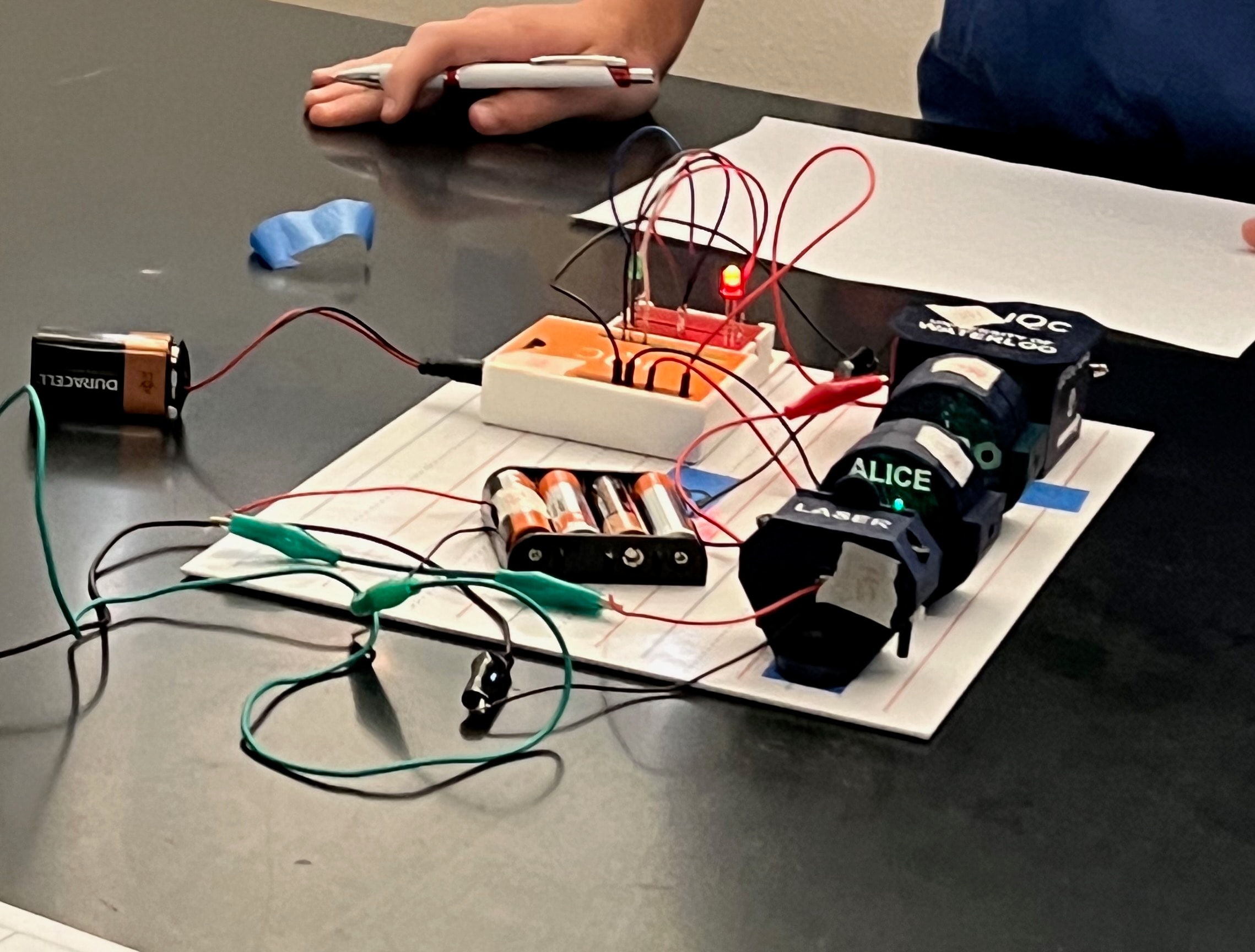 Quantum electronics experiment with laser components and circuit boards